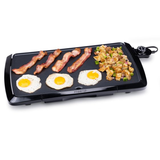 07030 20-inch Cool-touch Electric Griddle with fried eggs, bacon, and hash browns.