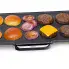 The 22-inch Electric Griddle cooking hamburgers.