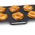 The 22-inch Electric Griddle cooking grilled cheese sandwiches.