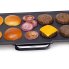 The 22-inch Electric Griddle cooking hamburgers.