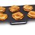 The 22-inch Electric Griddle cooking grilled cheese sandwiches.