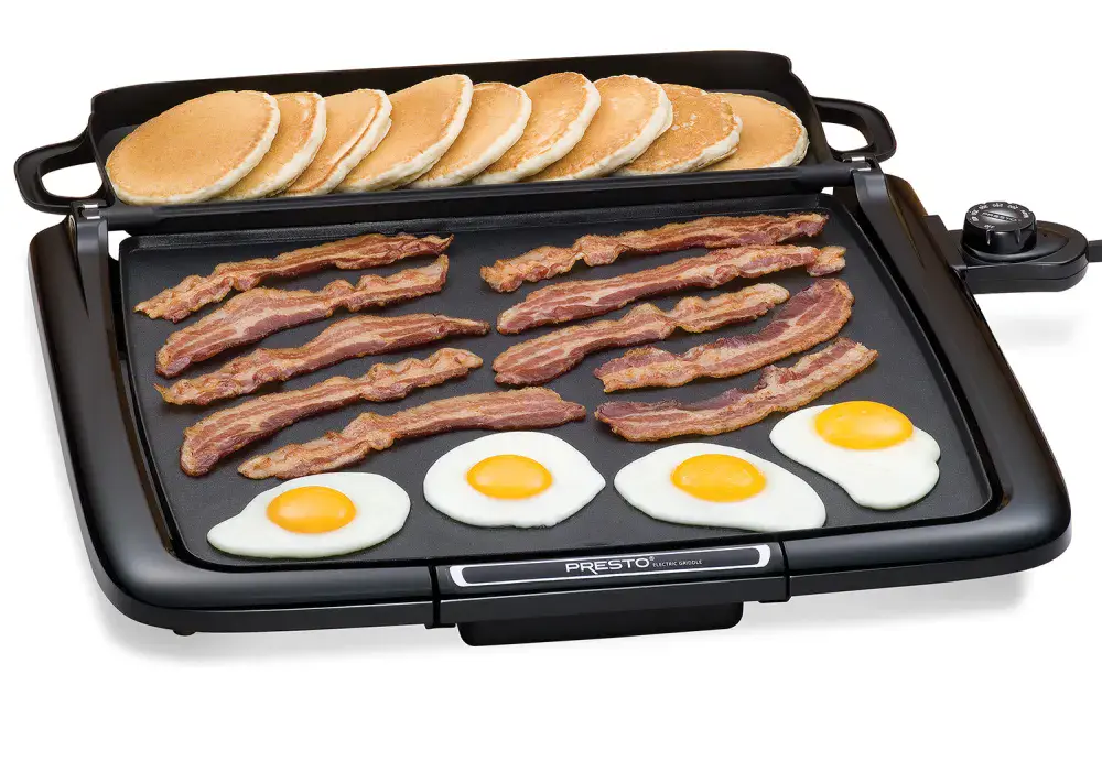 07023 Cool-touch Electric Griddle/Warmer Plus cooking bacon and fried eggs with pancakes in the tray.