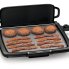 The Cool-touch Electric Griddle/Warmer Plus cooking bacon and hamburgers with the tray up to act as a spatter shield.