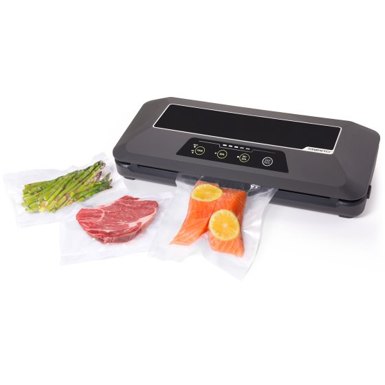 05622 FreshDaddy Automatic Vacuum Sealer sealing a bag containing a steak.