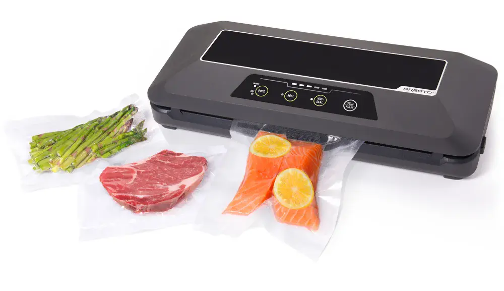 05622 FreshDaddy Automatic Vacuum Sealer sealing a bag containing a steak.