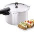 The 8-Quart Aluminum Pressure Cooker with baked potatoes.