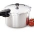 The 8-Quart Aluminum Pressure Cooker with four tomatoes.