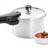 The 4-Quart Aluminum Pressure Cooker with a bowl of soup.