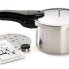 The 4-Quart Aluminum Pressure Cooker with the pressure regulator, cooking rack, and instruction book alongside.