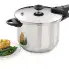 The 6-Quart Stainless Steel Pressure Cooker with chicken and green beans on a plate.