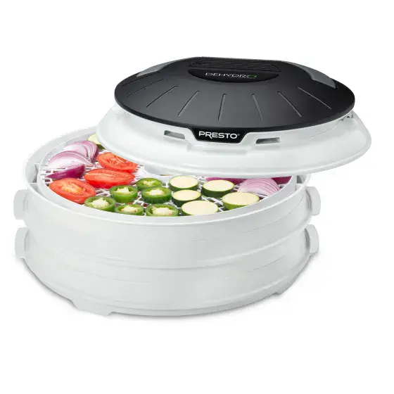 06300 Dehydro Electric Food Dehydrator with vegetables drying in the top tray.