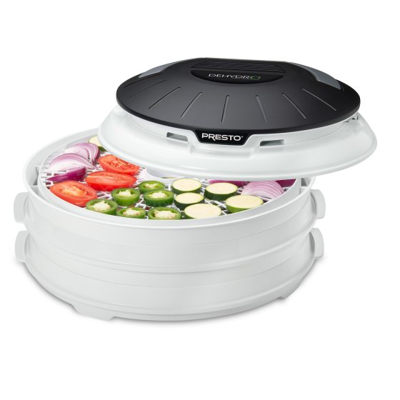 06300 Dehydro Electric Food Dehydrator with vegetables drying in the top tray.