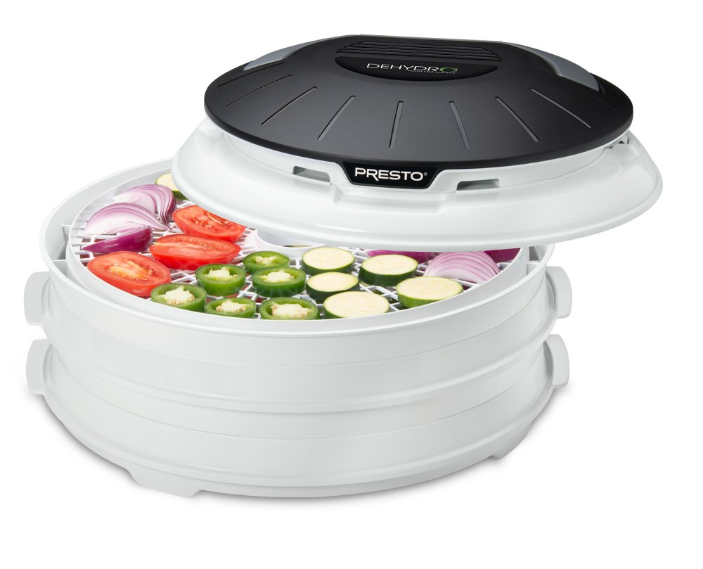 06300 Dehydro Electric Food Dehydrator with vegetables drying in the top tray.