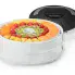 The Dehydro Electric Food Dehydrator with fruit drying in the top tray.