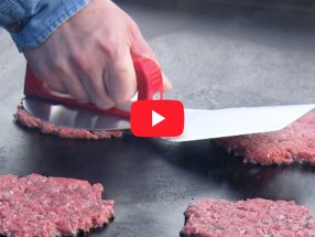 Link to a video about making perfect smash burgers with the Smashula stainless steel burger press and spatula.