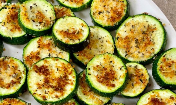 Parmesan Zucchini Bites on a plate.