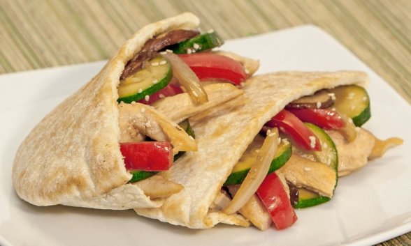 Stir-Fry Chicken and Vegetable Pitas on a plate.