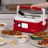Presto 6-quart Nomad Traveling Slow Cooker on a kitchen counter with slow cooked food in the foreground.