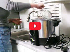Water being poured from a Digital Canner into the sink.
