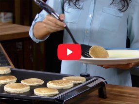 A scene from the Tilt-n-Fold XL Griddle video.