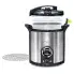 The Presto Precise 17-Quart Digital Pressure Canner with the cover open and the canning rack along side the canner.